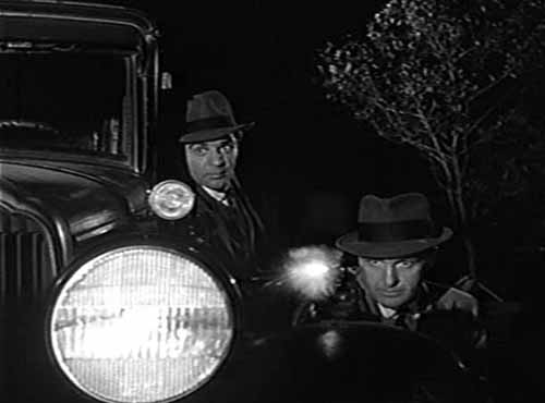 Lee Hobson and Eliot Ness in a gun battle
